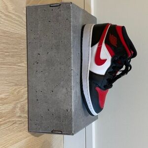 Big kids size 4 mid top Jordan 1 sneakers barely worn